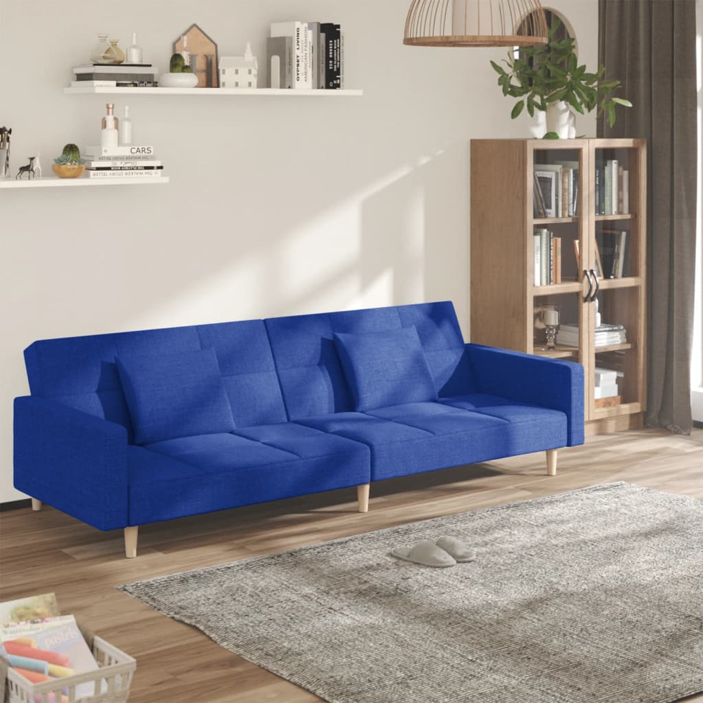 Canapé-lit à 2 places avec deux oreillers bleu tissu