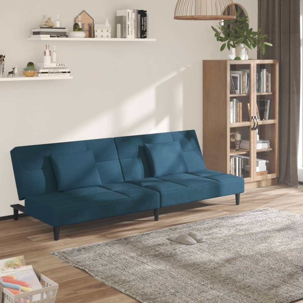 Canapé-lit à 2 places avec deux oreillers bleu velours