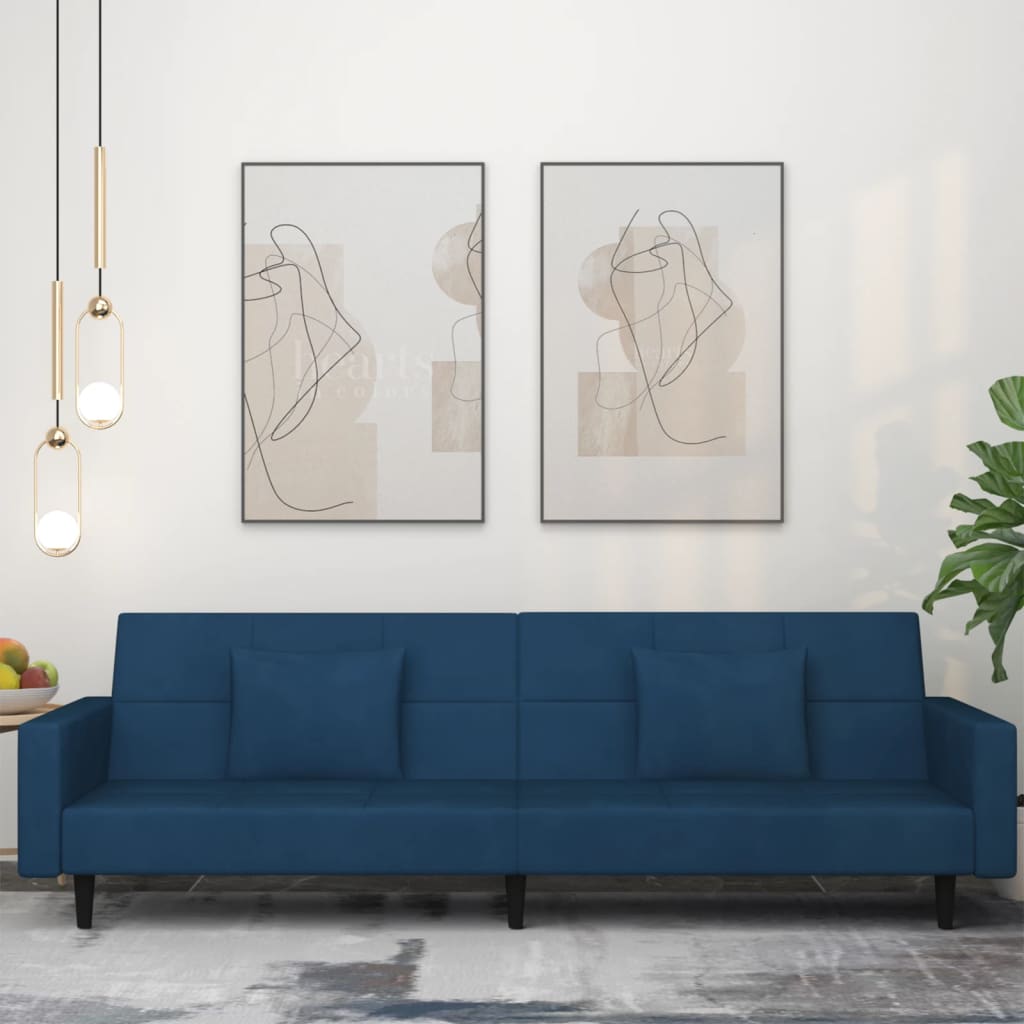 Canapé-lit à 2 places avec deux oreillers bleu velours